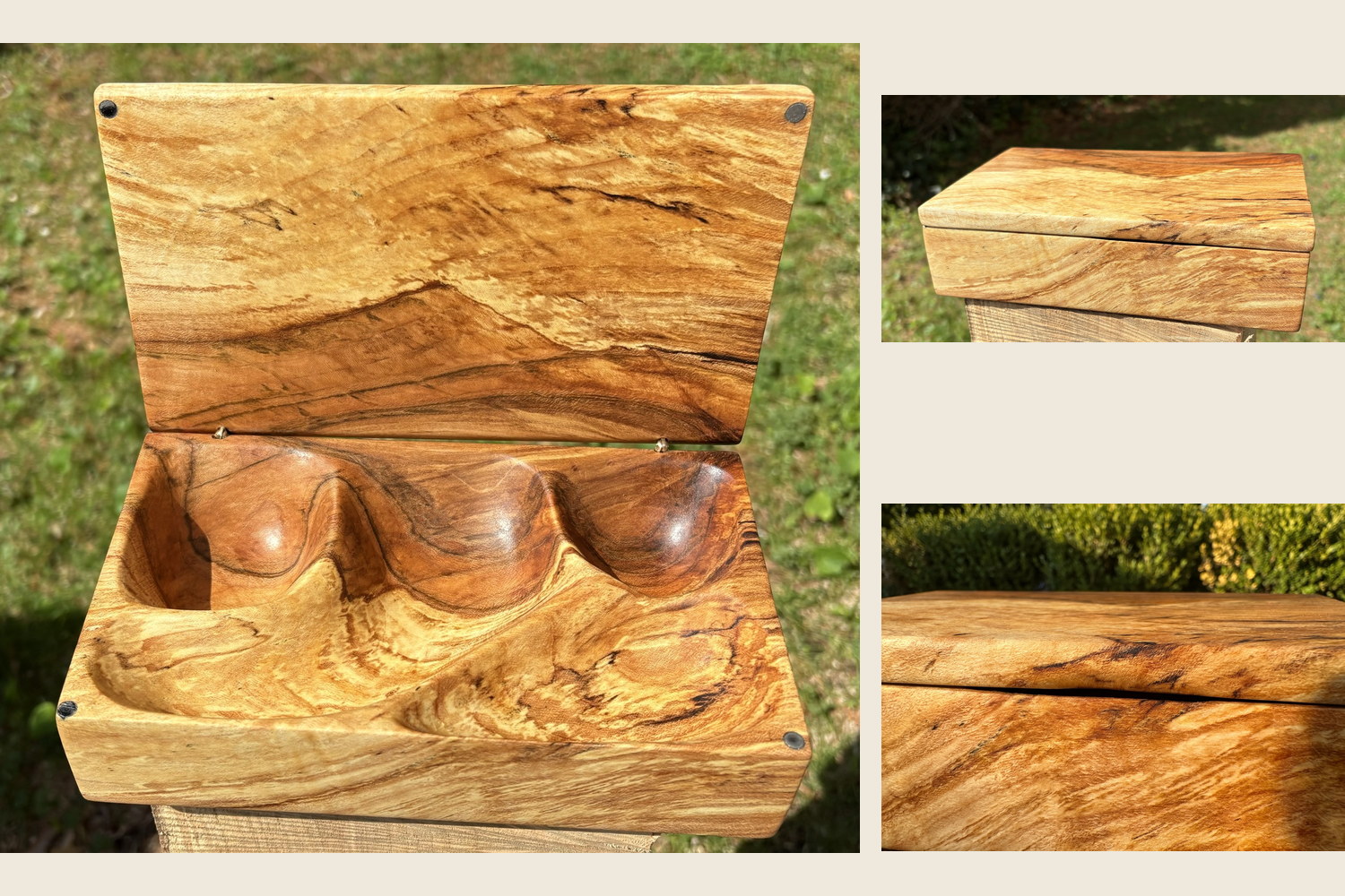 Spalted maple jewelry box, viewed from the front showing the dark figure on the lid.